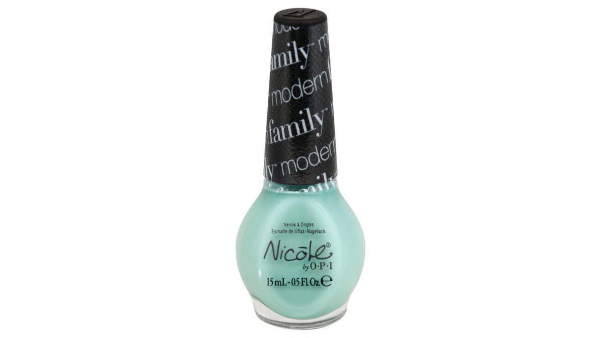mint green colored nail polish bottle on a white background