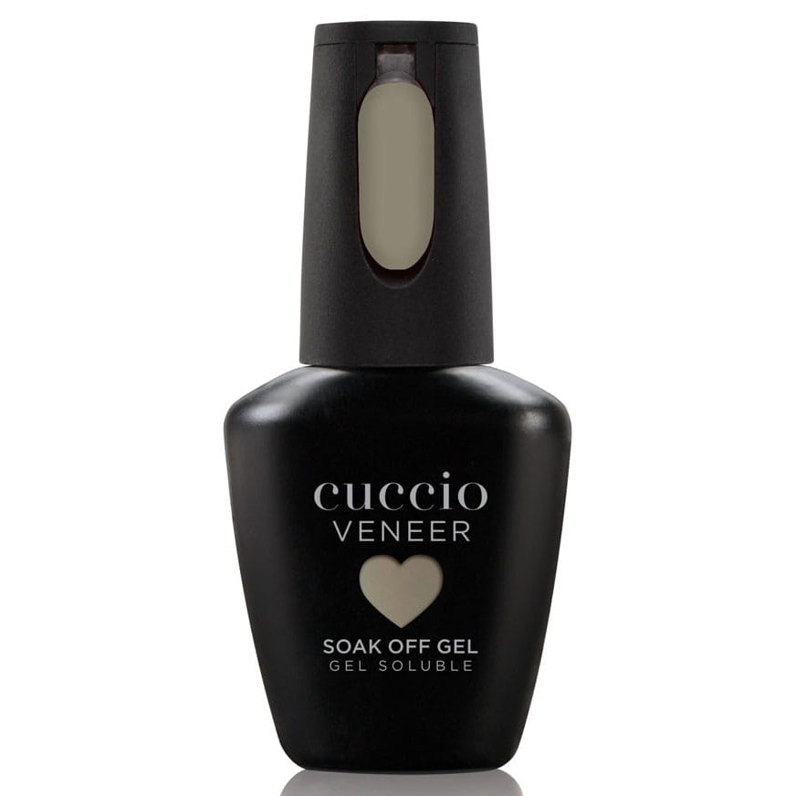 Black bottle of Cuccio Veneer soak off gel on a white background