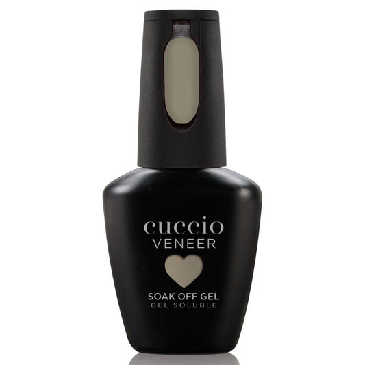 Black bottle of Cuccio Veneer soak off gel on a white background
