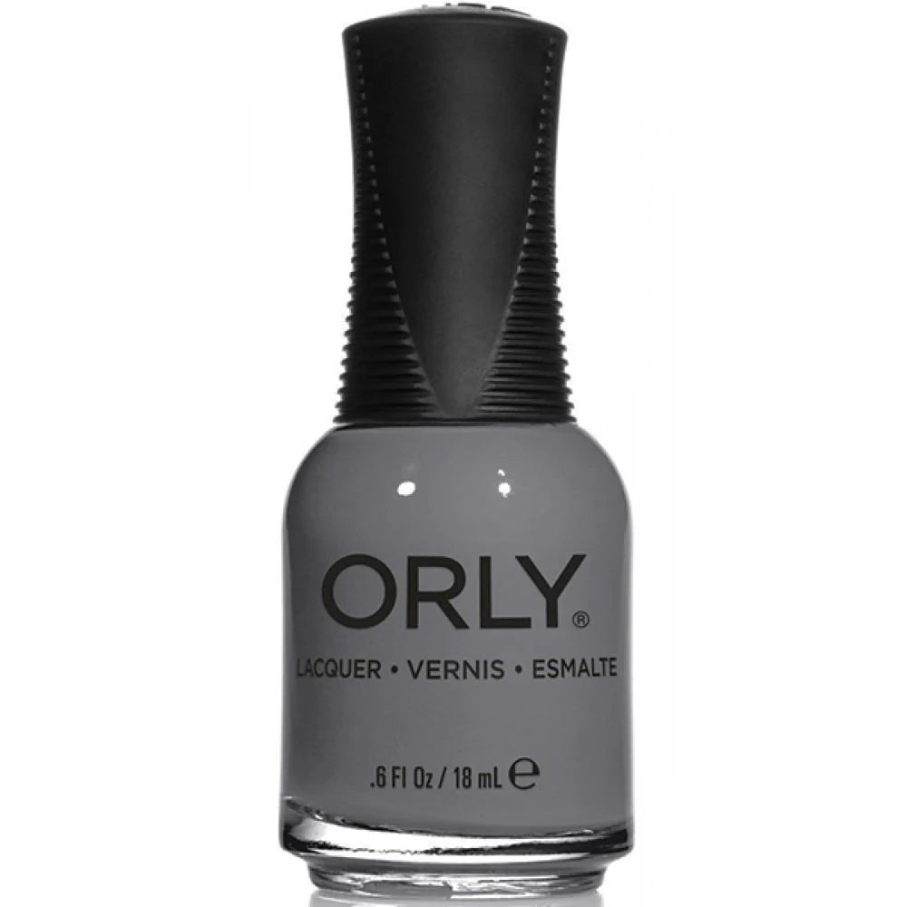 Orly nail polish bottle with gray polish on a white background