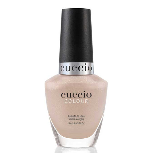Cuccio nail polish bottle on a white background