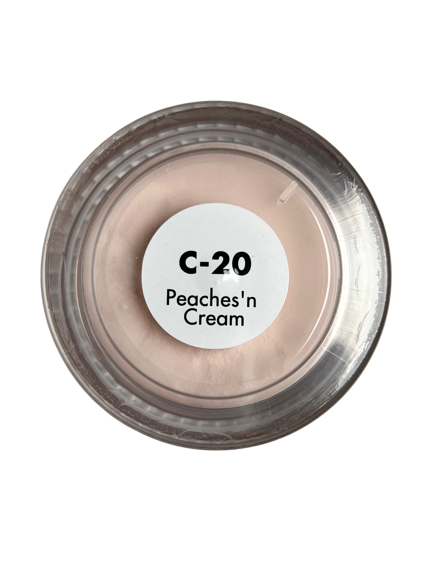 Cosmetic container labeled 'C-20 Peaches 'n Cream' on a white background