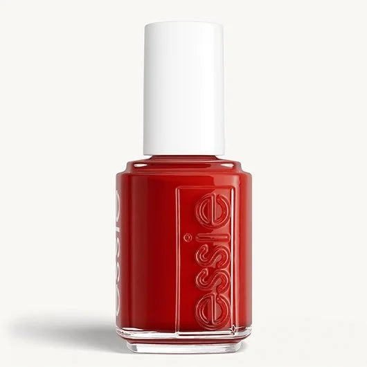 Red nail polish bottle with white cap on a white background