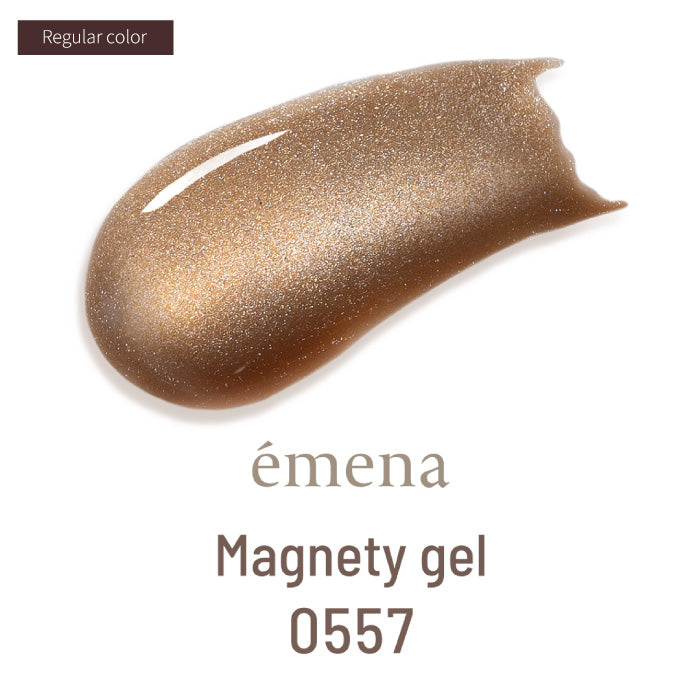Gold glittery gel swatch with 'emena' branding on a white background
