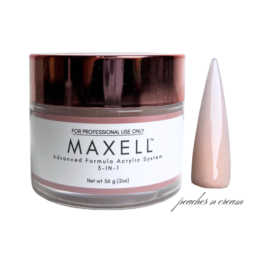 Maxell acrylic system jar with a sample of peach-colored powder on a white background