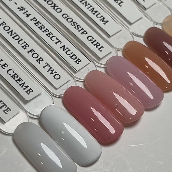 video showing different colors on a nail tip over a white background