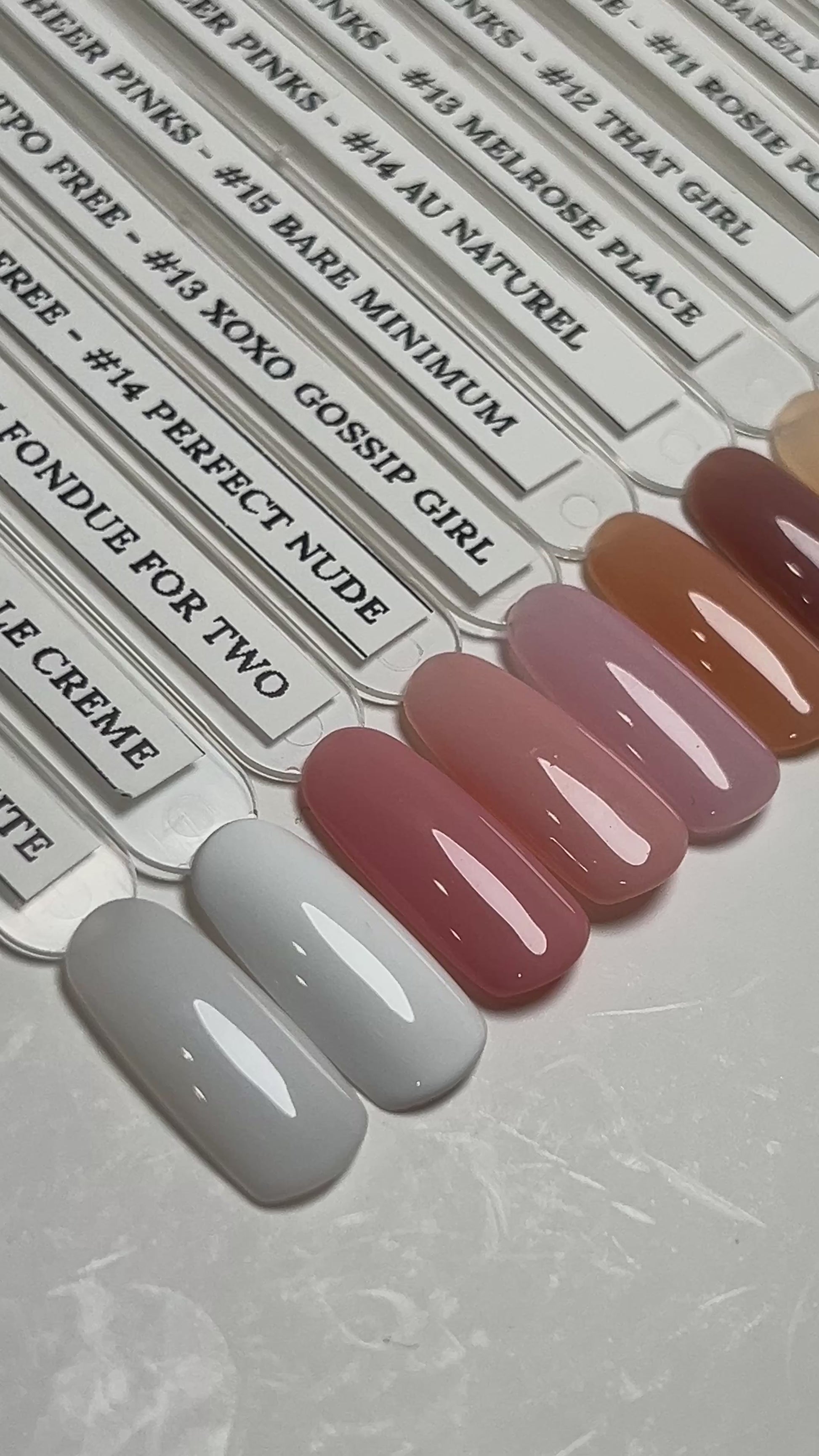 video showing different colors on a nail tip over a white background