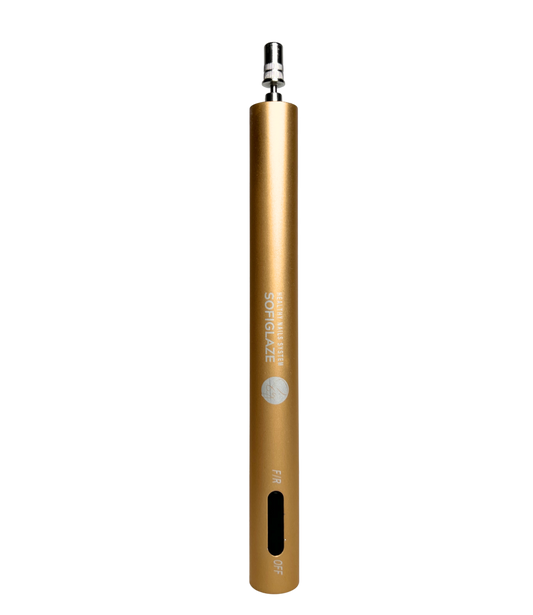 Gold pen nail drill on a white background