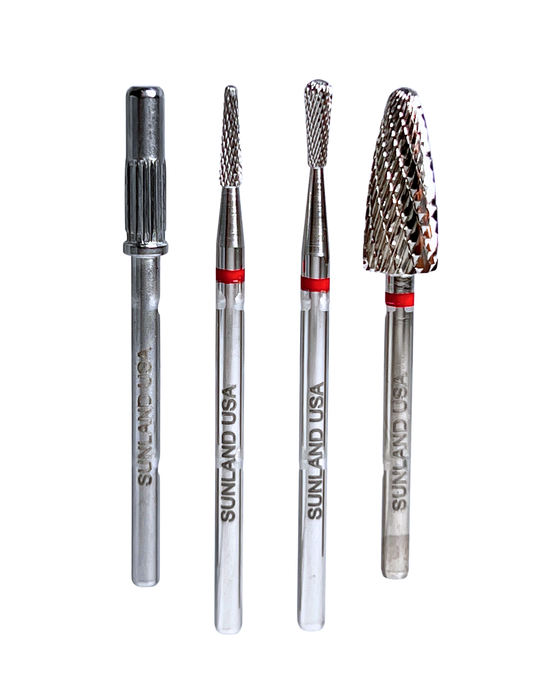 various dental burrs with "SUNLAND USA" logo printed on the shank on a white background