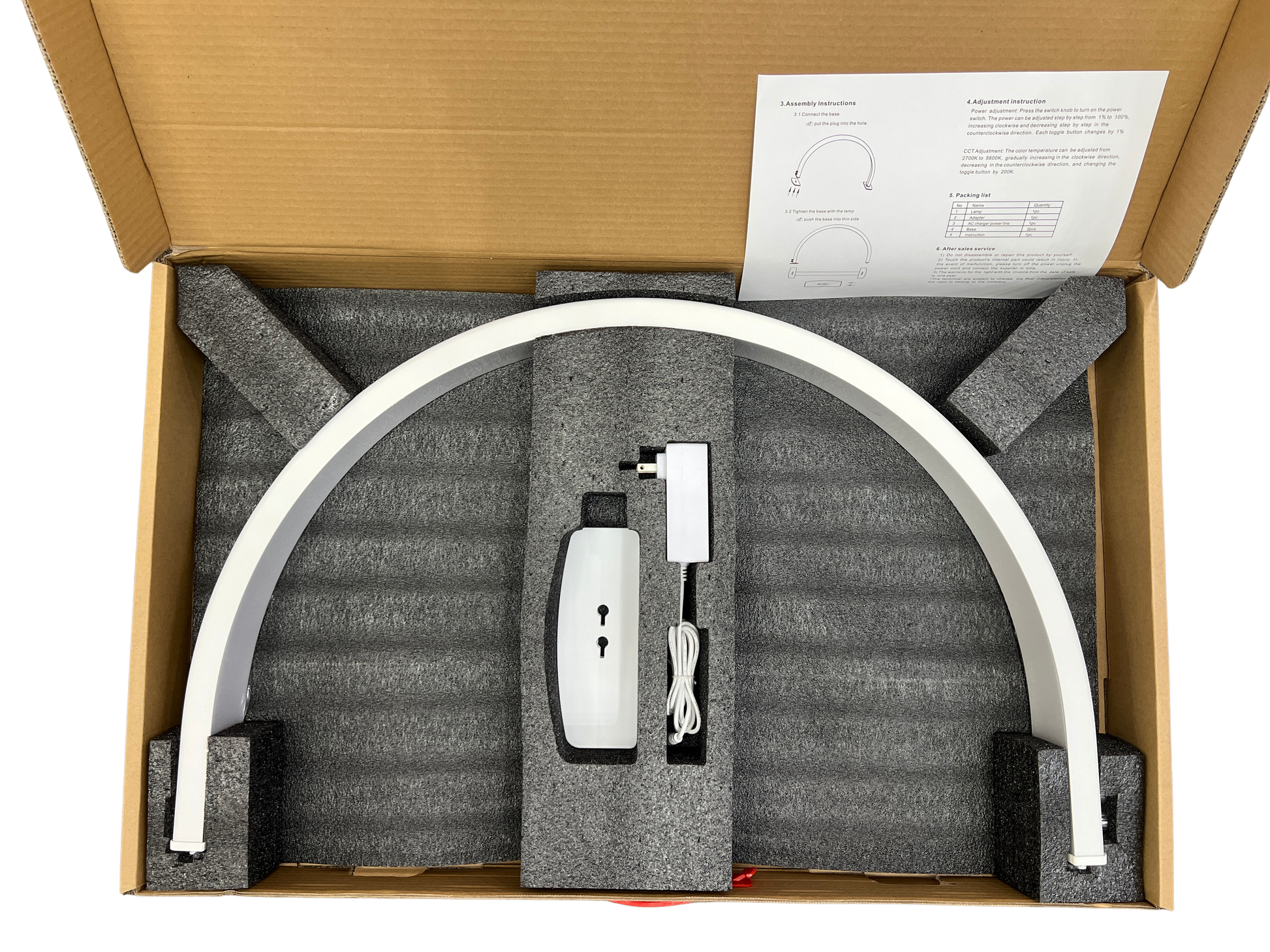 Product packaging with a curved white desk lamp, power adapter, and cable inside a cardboard box.
